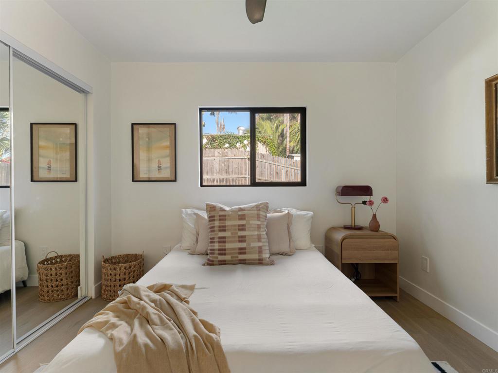 1482 Avocado Road Oceanside, CA 92054 - Photo 11 of 35 a bedroom with a bed and a window