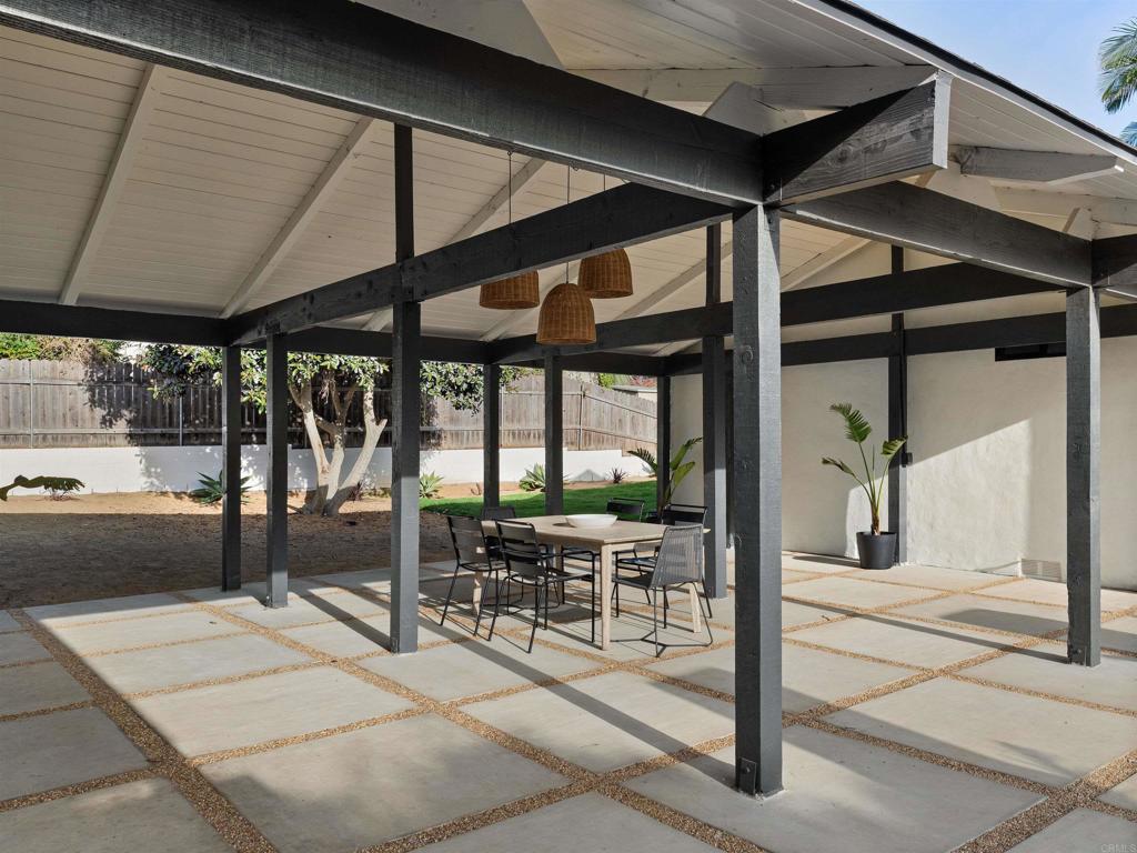 1482 Avocado Road Oceanside, CA 92054 - Photo 15 of 35 a view of a building with a sitting space