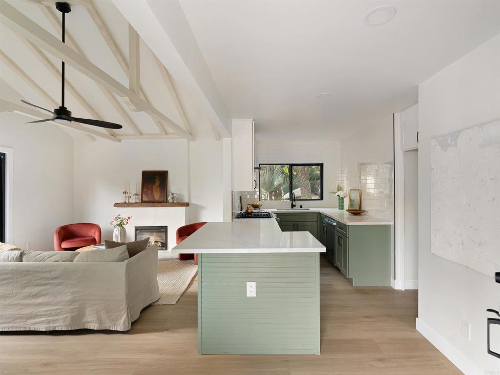 1482 Avocado Road Oceanside, CA 92054 - Photo 17 of 35 a living room with furniture and a flat screen tv