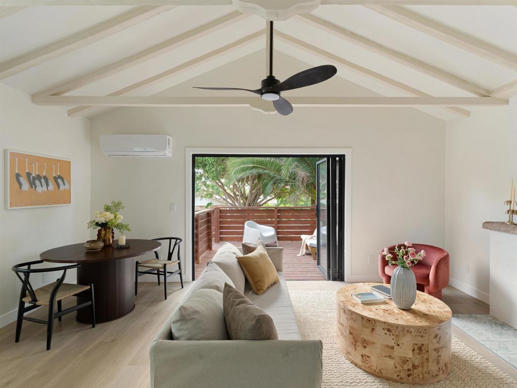 1482 Avocado Road Oceanside, CA 92054 - Photo 19 of 35 a living room with furniture and a window