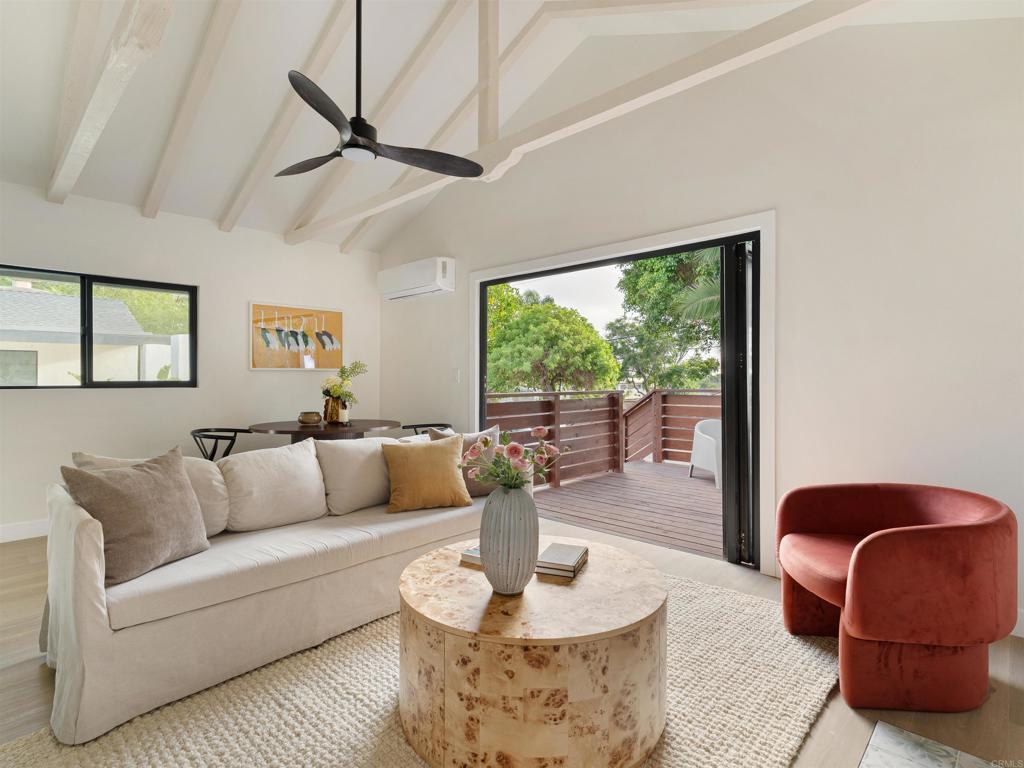 1482 Avocado Road Oceanside, CA 92054 - Photo 20 of 35 a living room with furniture and a large window