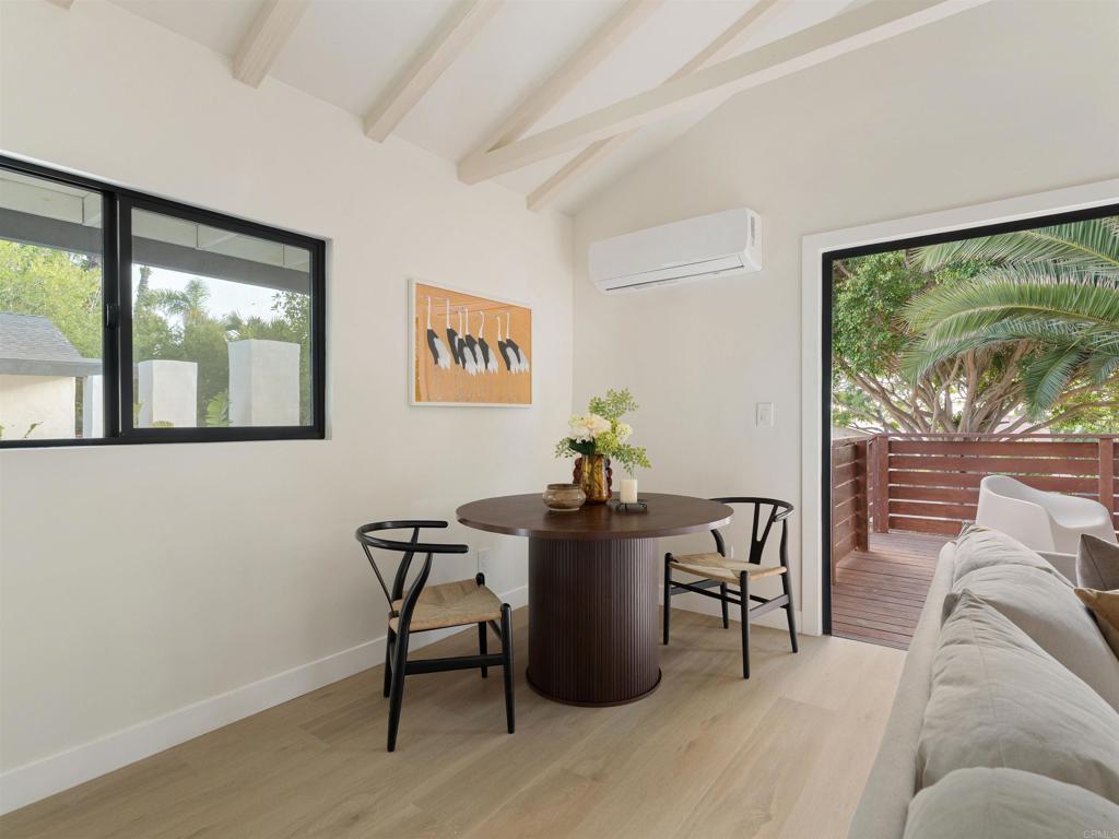 1482 Avocado Road Oceanside, CA 92054 - Photo 23 of 35 a living room with furniture and a window