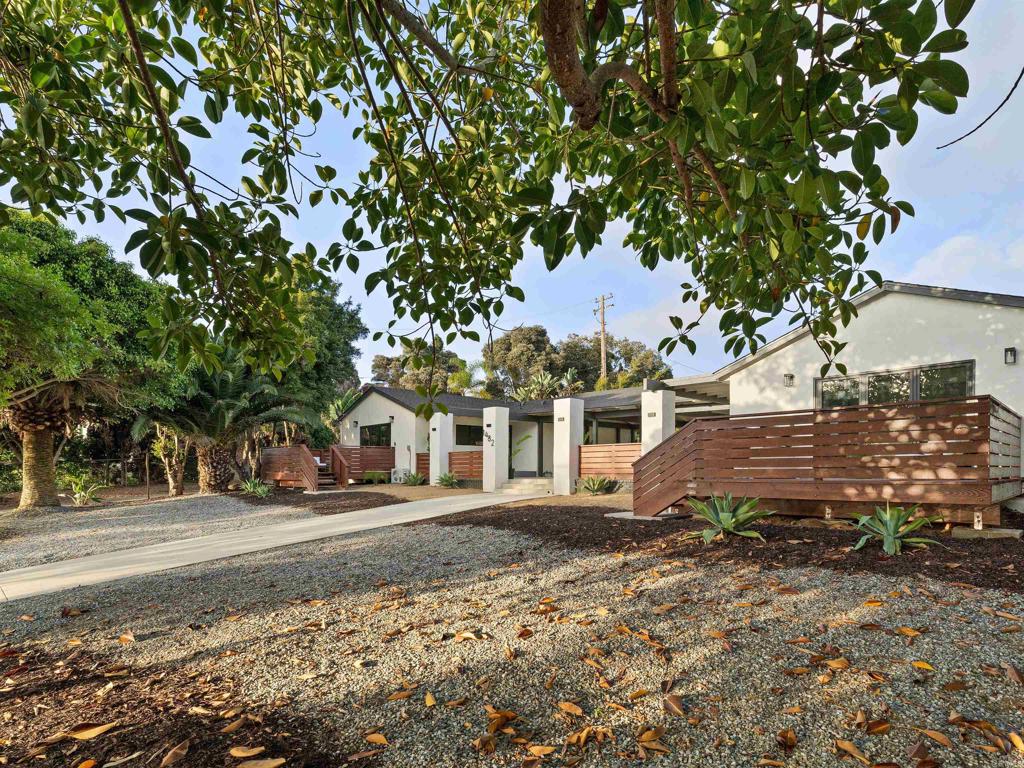 1482 Avocado Road Oceanside, CA 92054 - Photo 34 of 35 a front view of a house with a garden