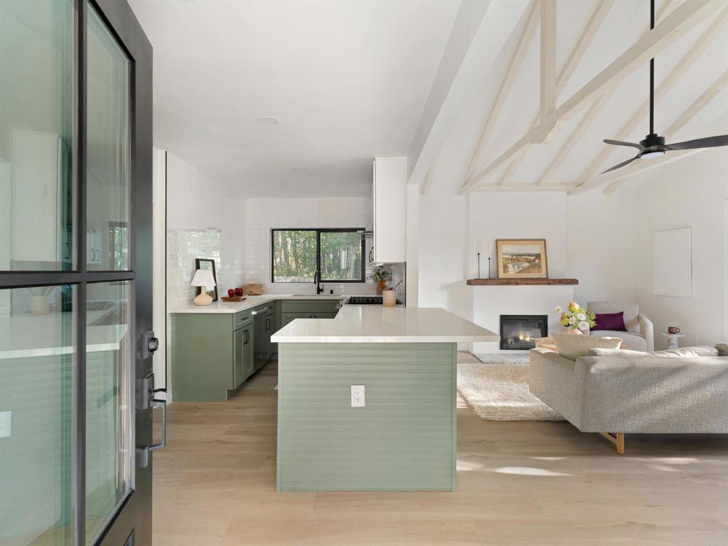 1482 Avocado Road Oceanside, CA 92054 - Photo 4 of 35 a living room with a couch and a table