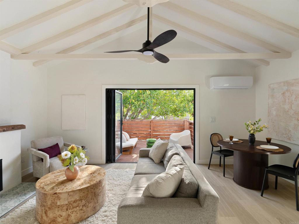 1482 Avocado Road Oceanside, CA 92054 - Photo 8 of 35 a living room with furniture and a window