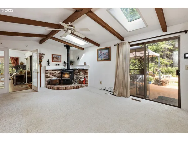 a view of livingroom with furniture and flat screen tv