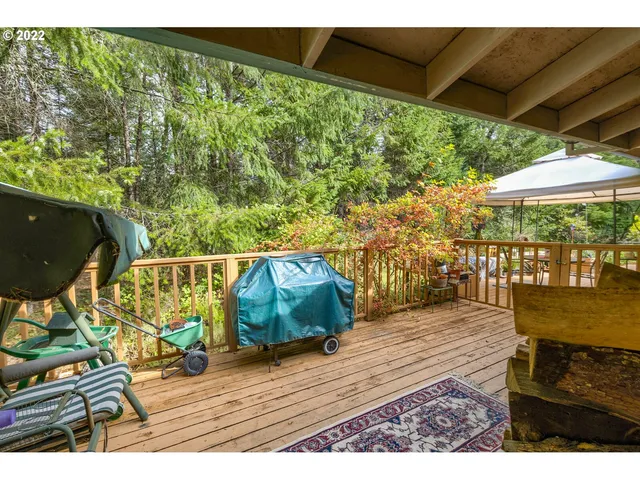 a balcony with wooden floor