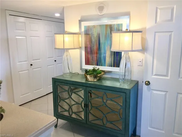 a bathroom with a sink a mirror and a shower