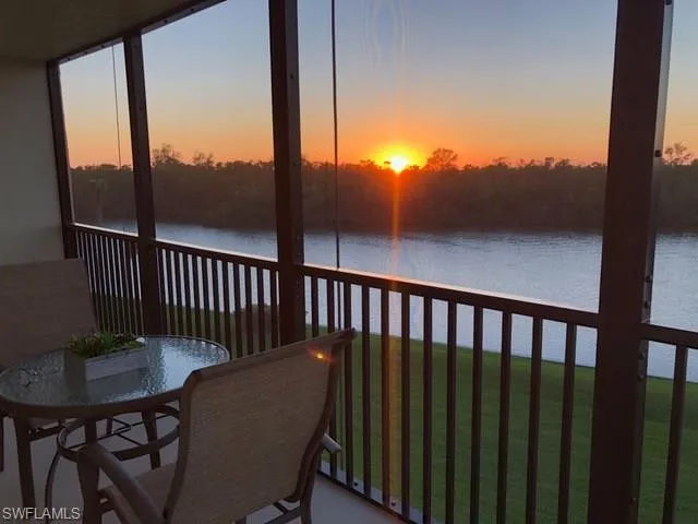 a view of a balcony with furniture