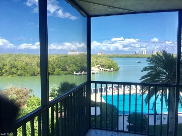 a view of a balcony with lake view