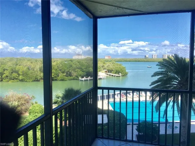 a view of a balcony with lake view