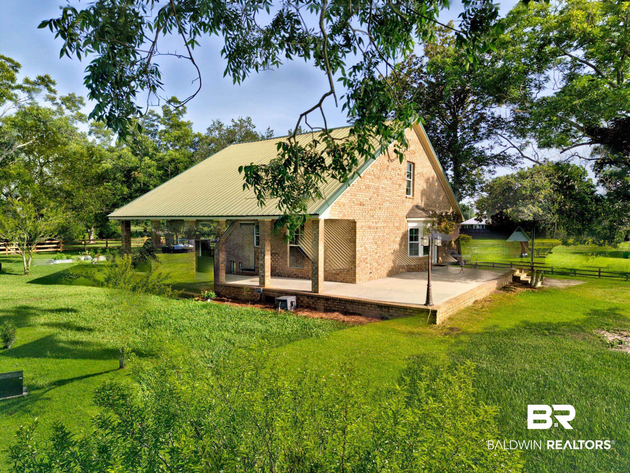 7564 Rabbit Run Road Fairhope, AL 36532 - Photo 63 of 88 Front of property with a patio area and brick siding