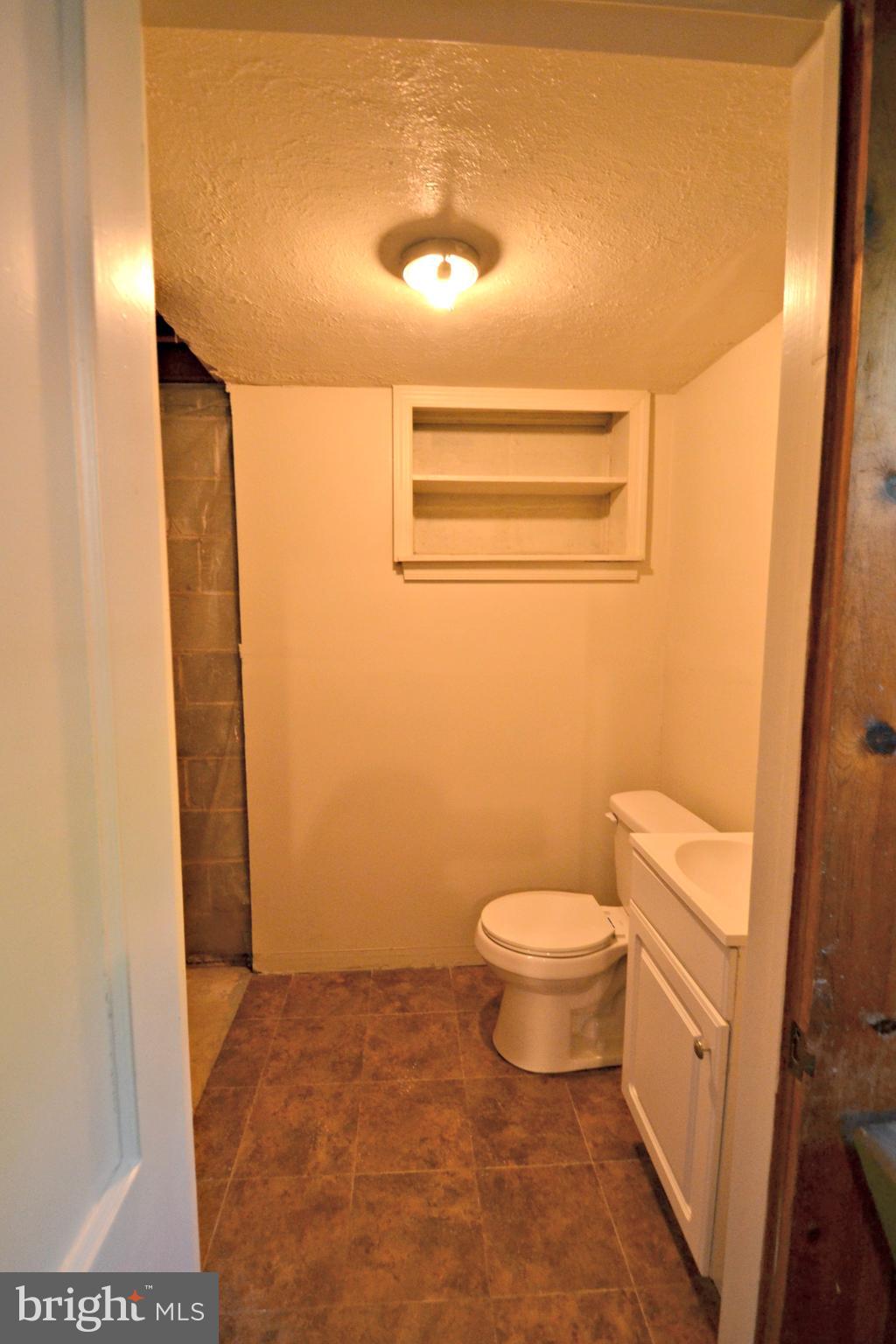 6156 Regent Park Road Baltimore, MD 21228 - Photo 22 of 30 lower level powder room