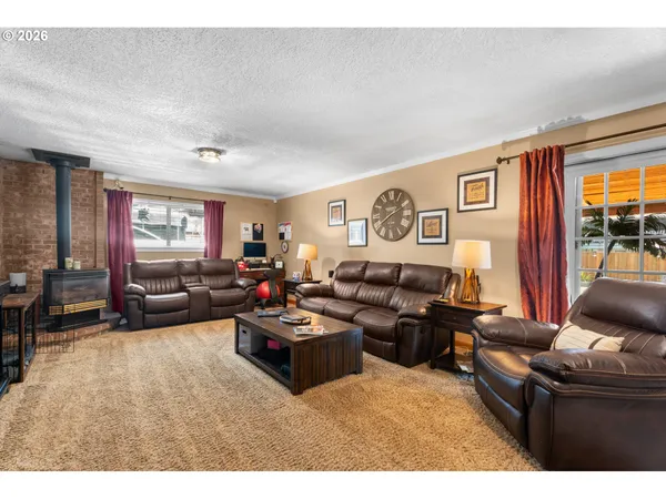 a room with furniture and a flat screen tv