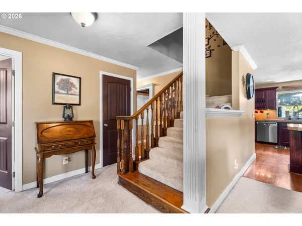 a view of livingroom with furniture and workspace