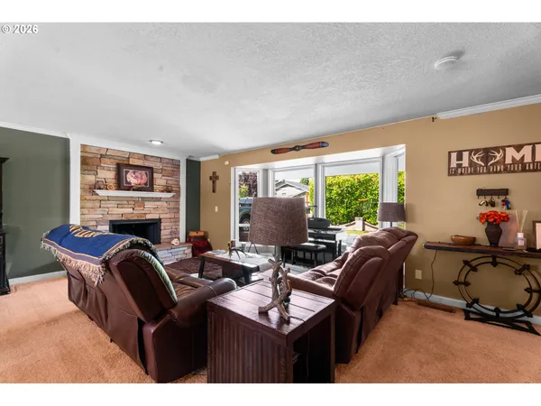 a living room with furniture and a table