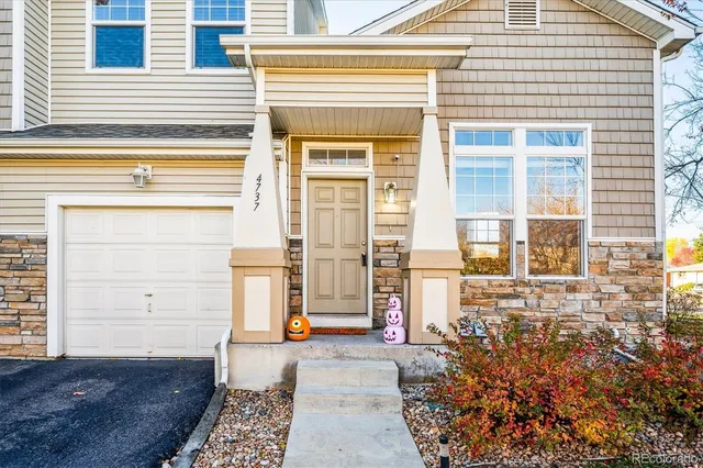 a view of a house with a large window
