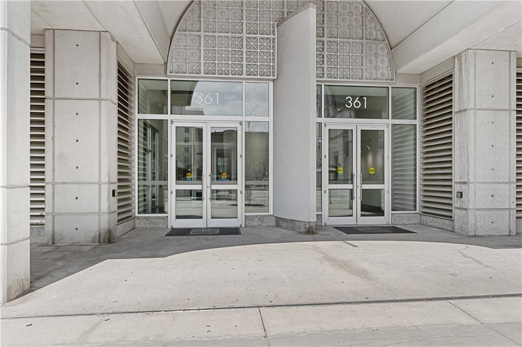 361 17th Street Northwest, Unit 2115 Atlanta, GA 30363 - Photo 18 of 24 a front view of a building with a window