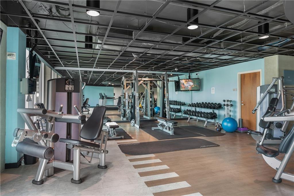361 17th Street Northwest, Unit 2115 Atlanta, GA 30363 - Photo 24 of 24 a view of a room with gym equipment