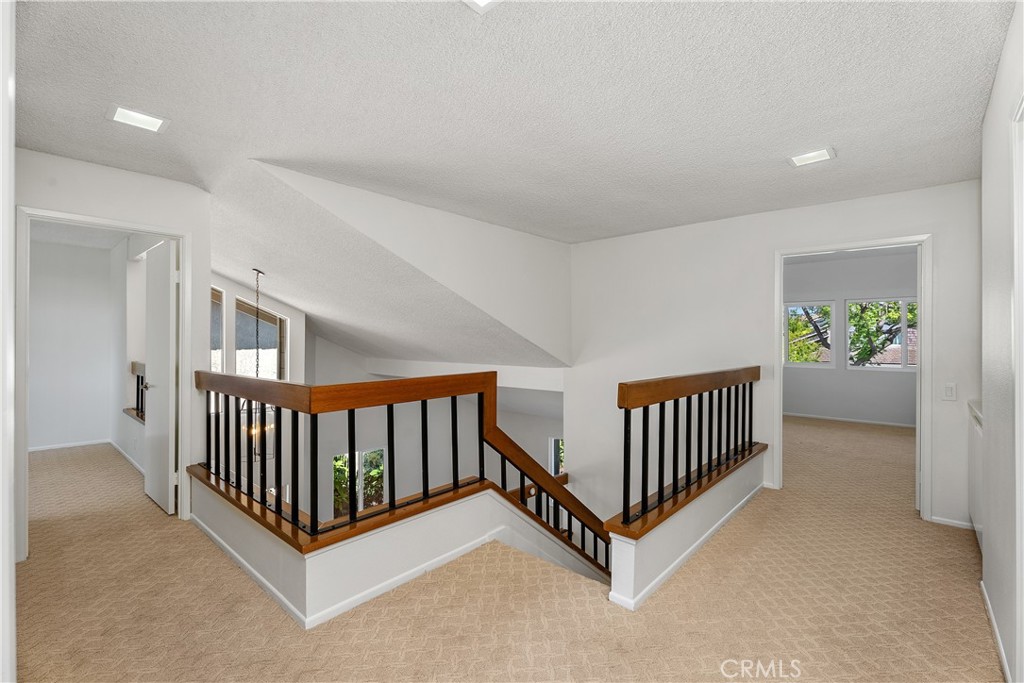 30 Entrada West Irvine, CA 92620 - Photo 21 of 41 a view of a porch with wooden & stairs