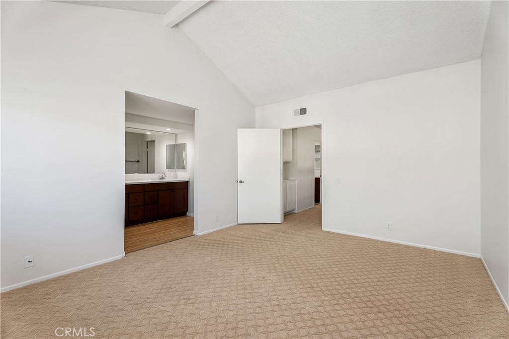 30 Entrada West Irvine, CA 92620 - Photo 23 of 41 a view of an empty room with a kitchen
