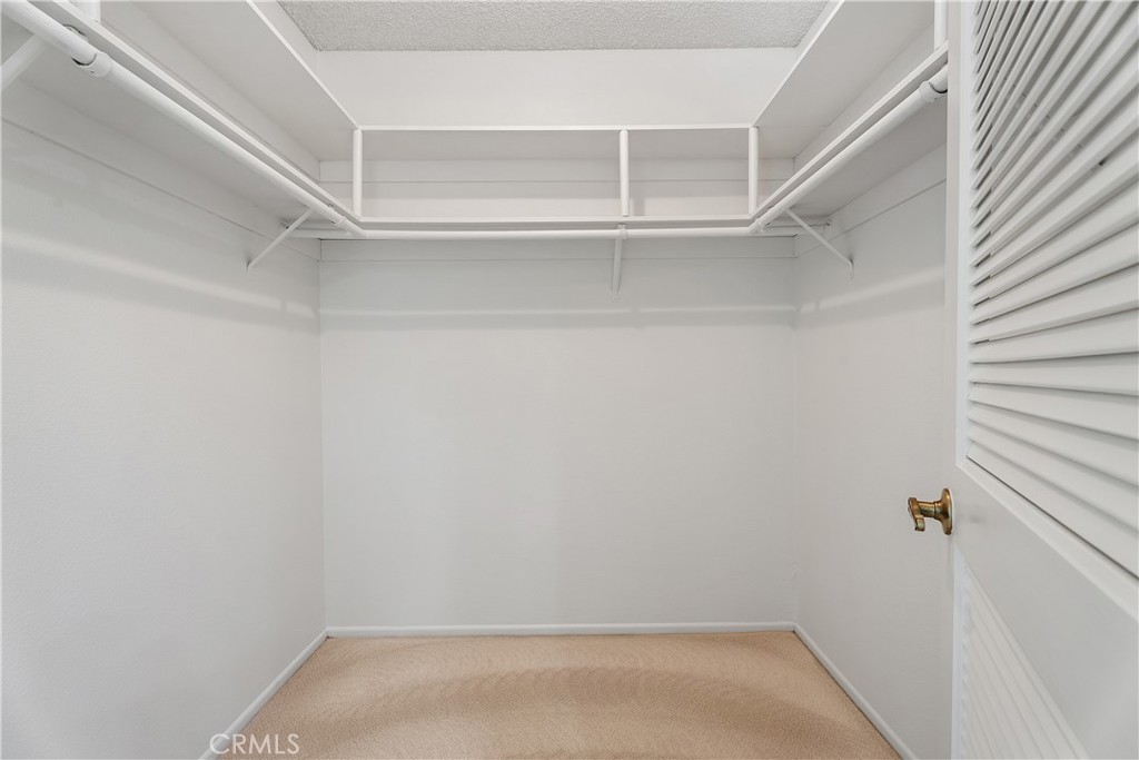 30 Entrada West Irvine, CA 92620 - Photo 27 of 41 a view of an empty walk in closet