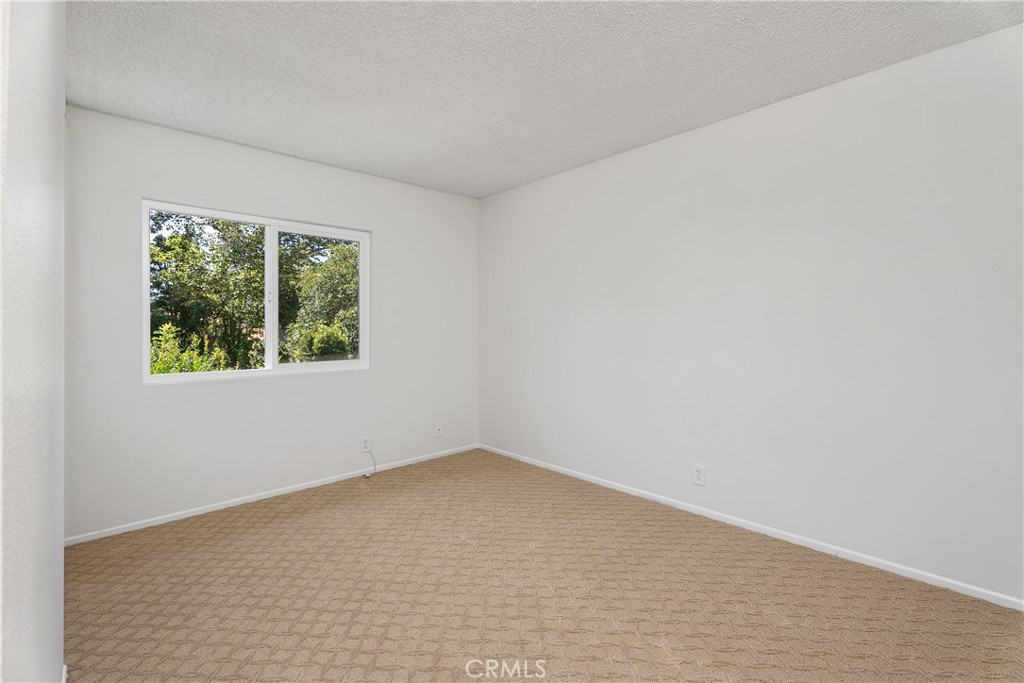 30 Entrada West Irvine, CA 92620 - Photo 28 of 41 an empty room with a window
