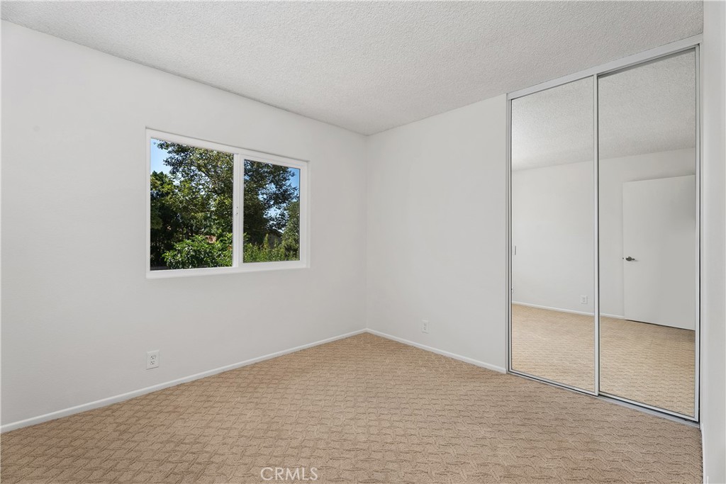30 Entrada West Irvine, CA 92620 - Photo 30 of 41 an empty room with a window