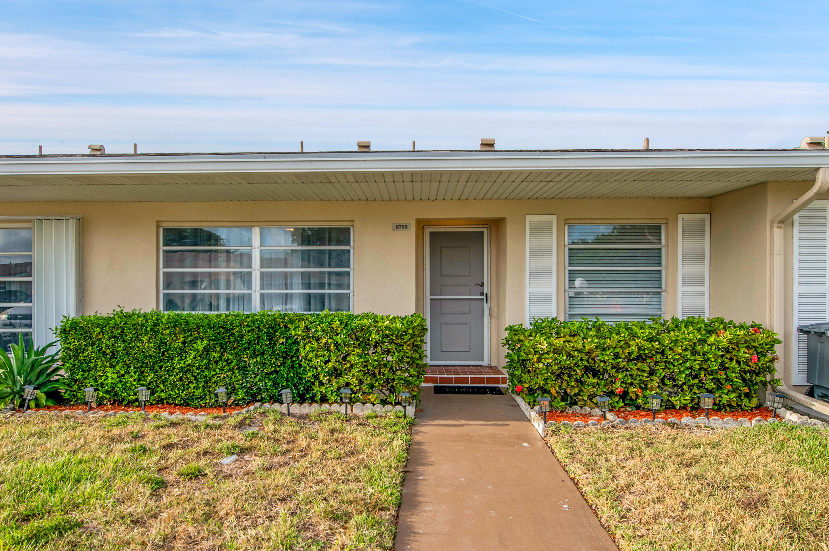 8799 Bella Vista Drive, Unit 2780 Boca Raton, FL 33433 - Photo 30 of 59 front view of a building