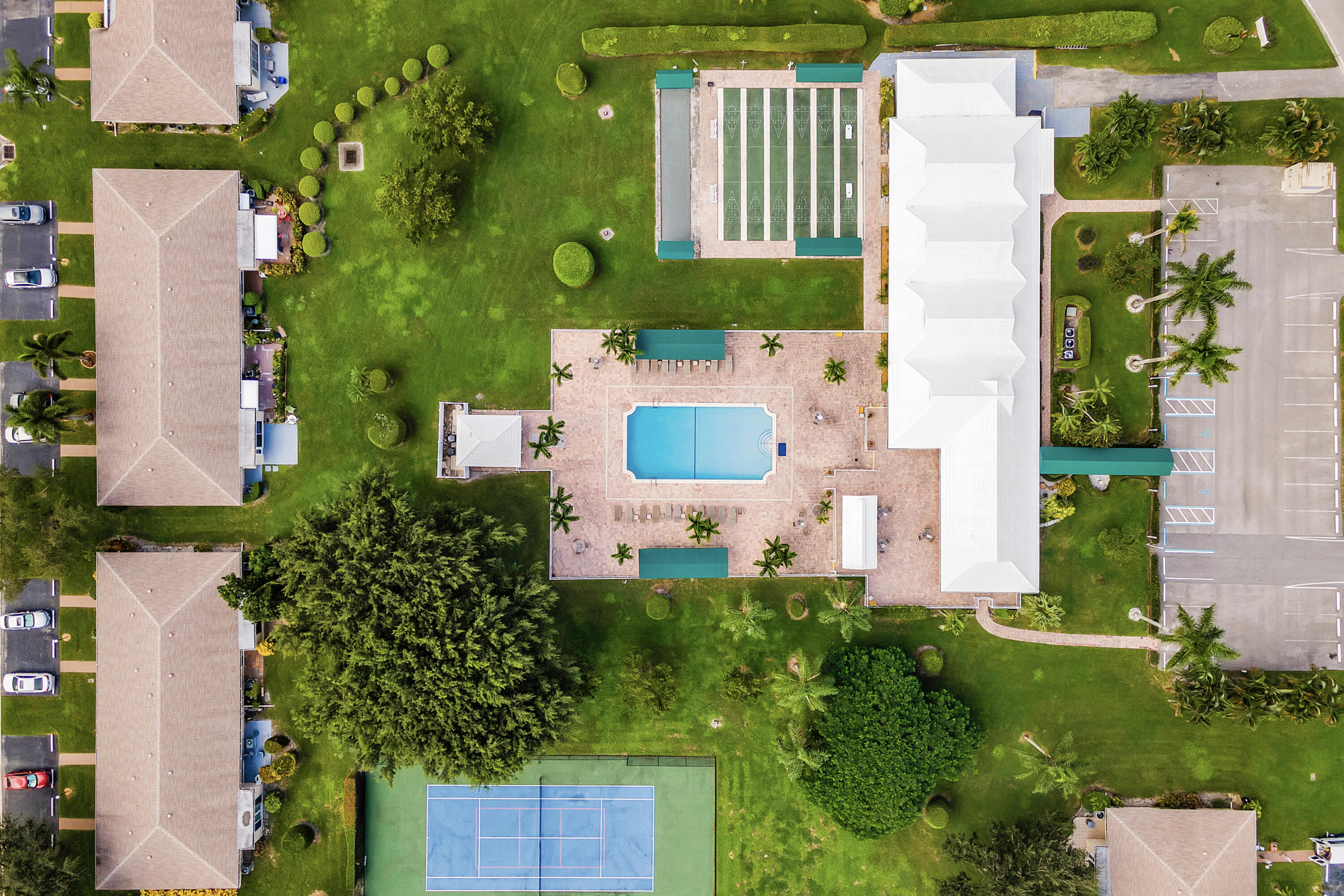 8799 Bella Vista Drive, Unit 2780 Boca Raton, FL 33433 - Photo 59 of 59 an aerial view of a house with a yard and garden