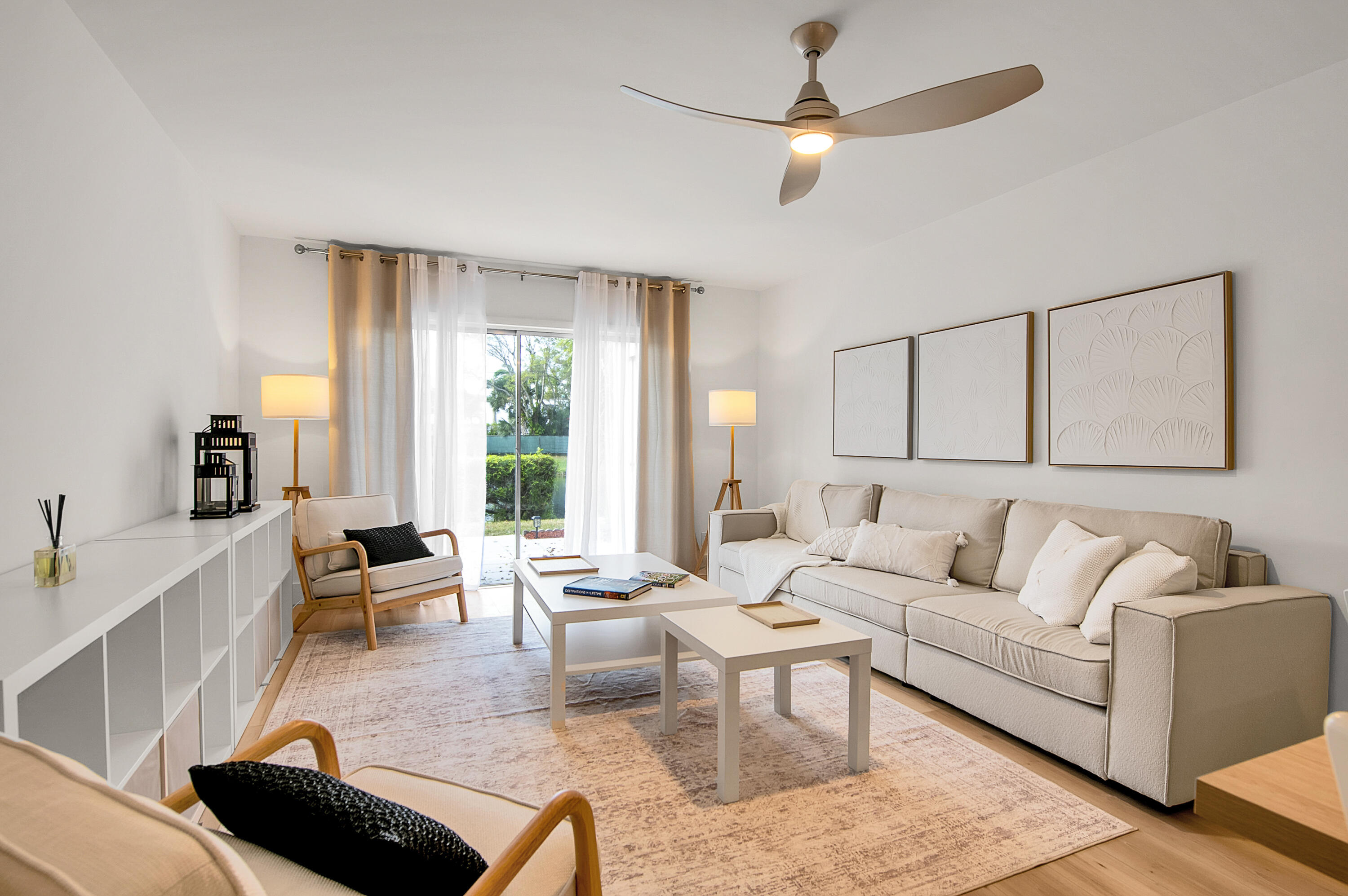 8799 Bella Vista Drive, Unit 2780 Boca Raton, FL 33433 - Photo 9 of 59 a living room with furniture and a large window