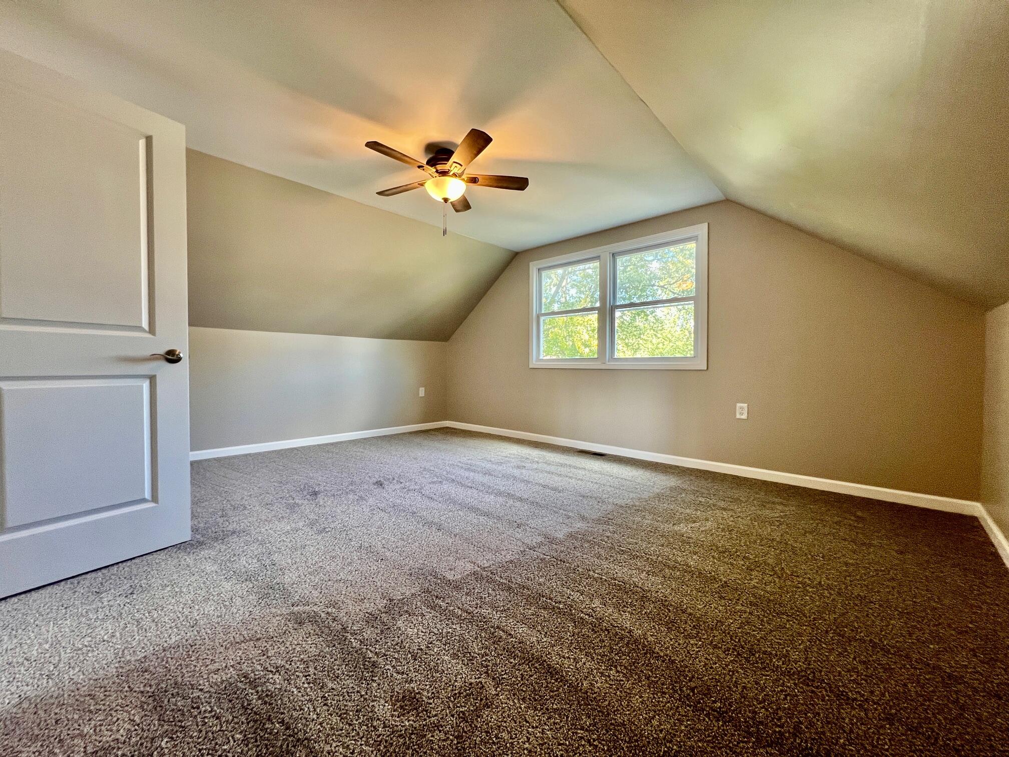 753 Imperial Road Valparaiso, IN 46385 - Photo 7 of 10 en empty room with windows and ceiling fan view
