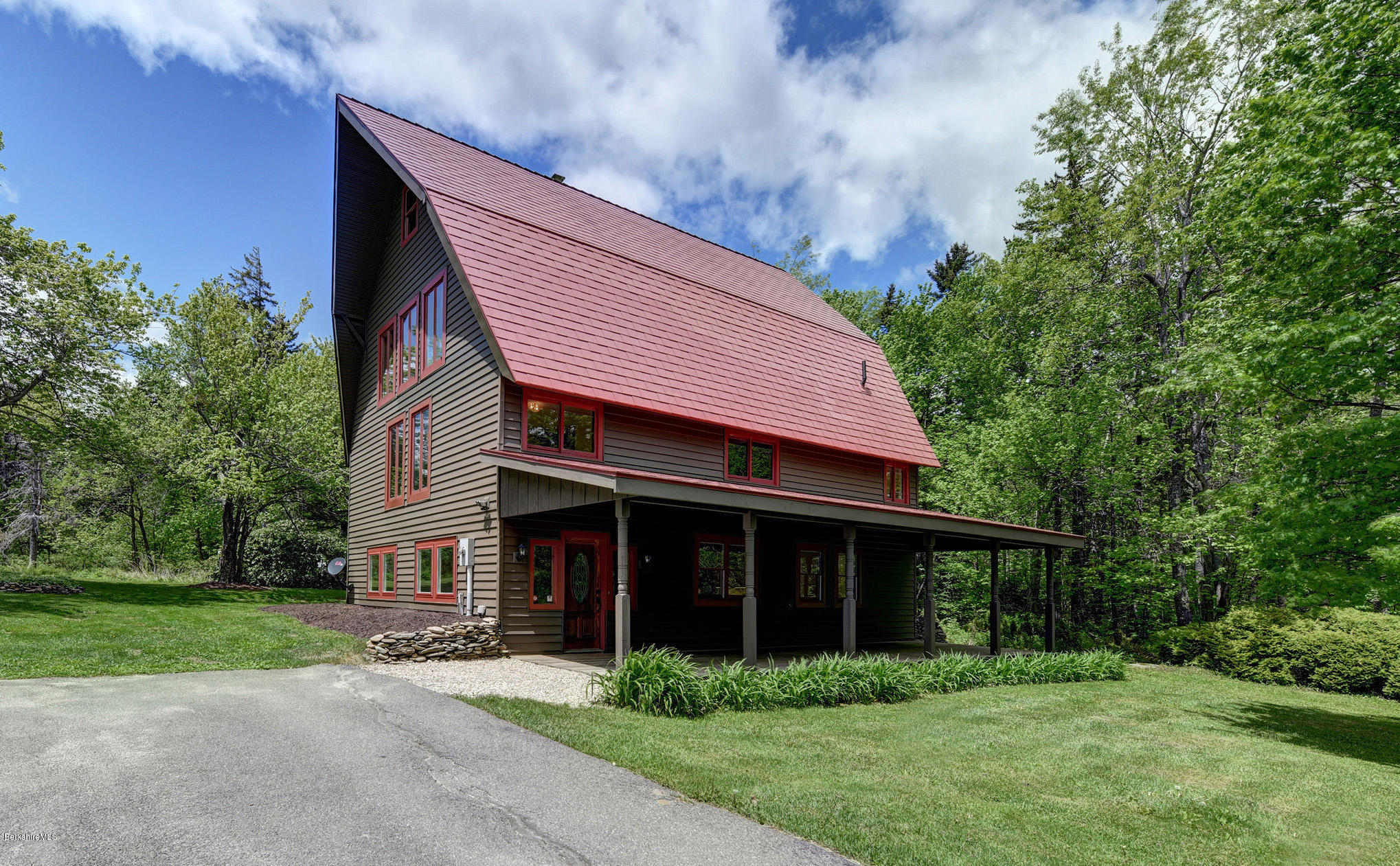 5 N Road Peru, MA 01235 - Photo 2 of 43 a front view of a house with a garden