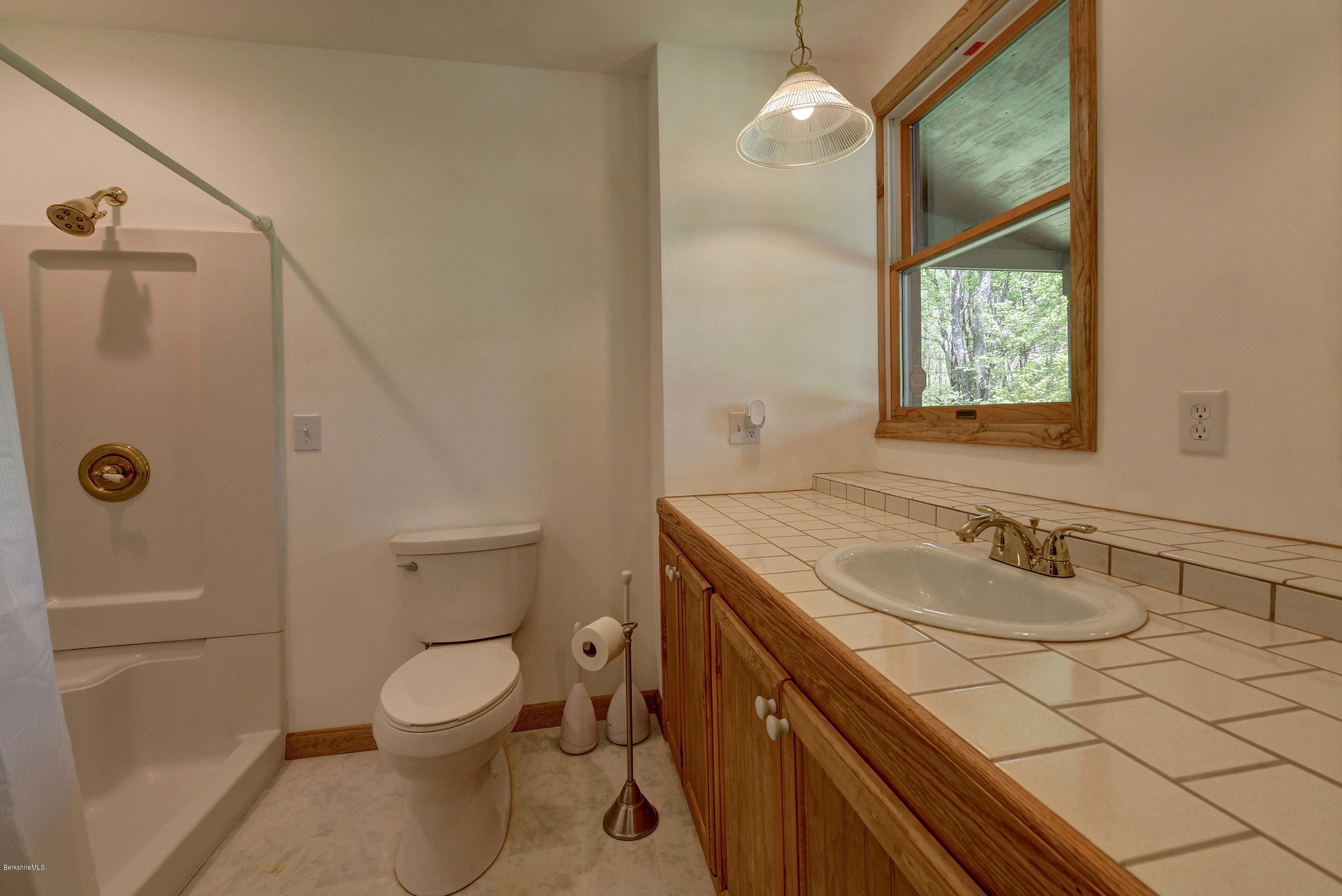 5 N Road Peru, MA 01235 - Photo 13 of 43 a bathroom with a sink a toilet and shower