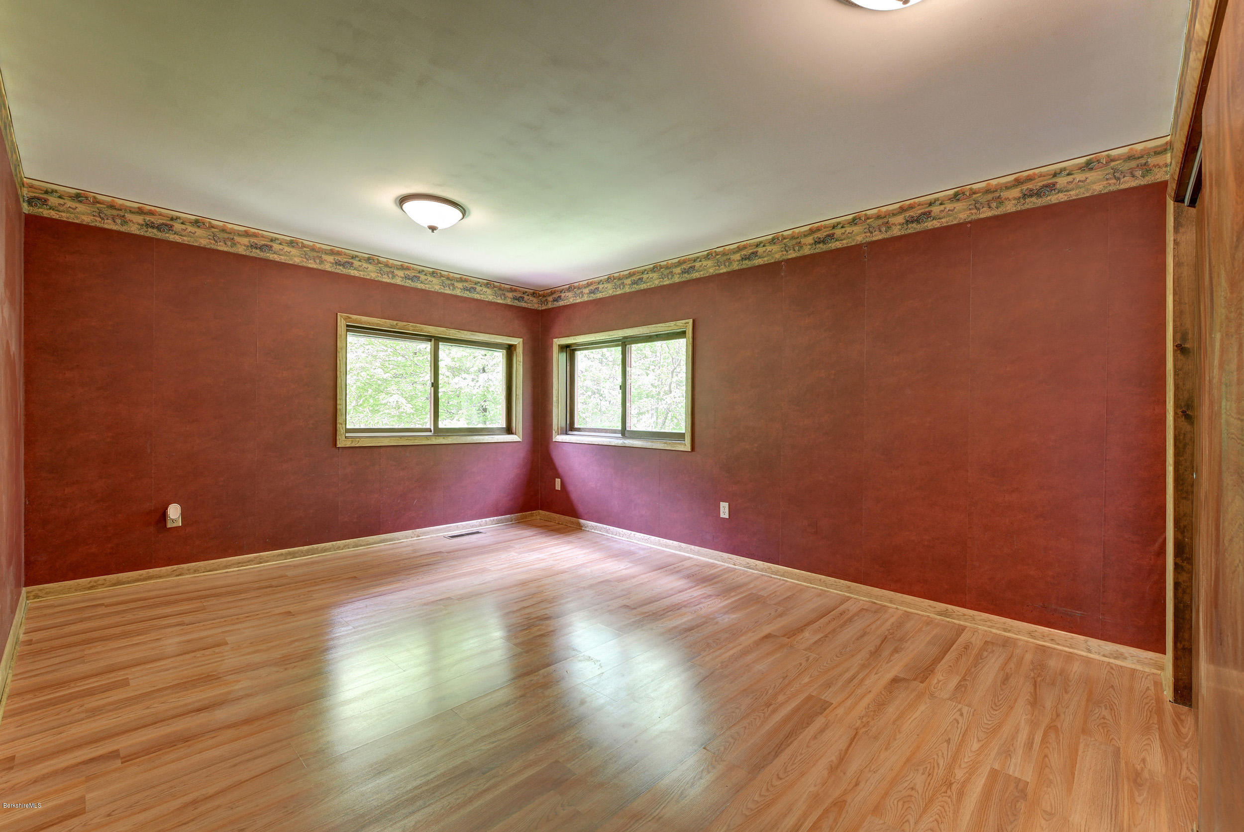 5 N Road Peru, MA 01235 - Photo 18 of 43 a view of an empty room with wooden floor and a window