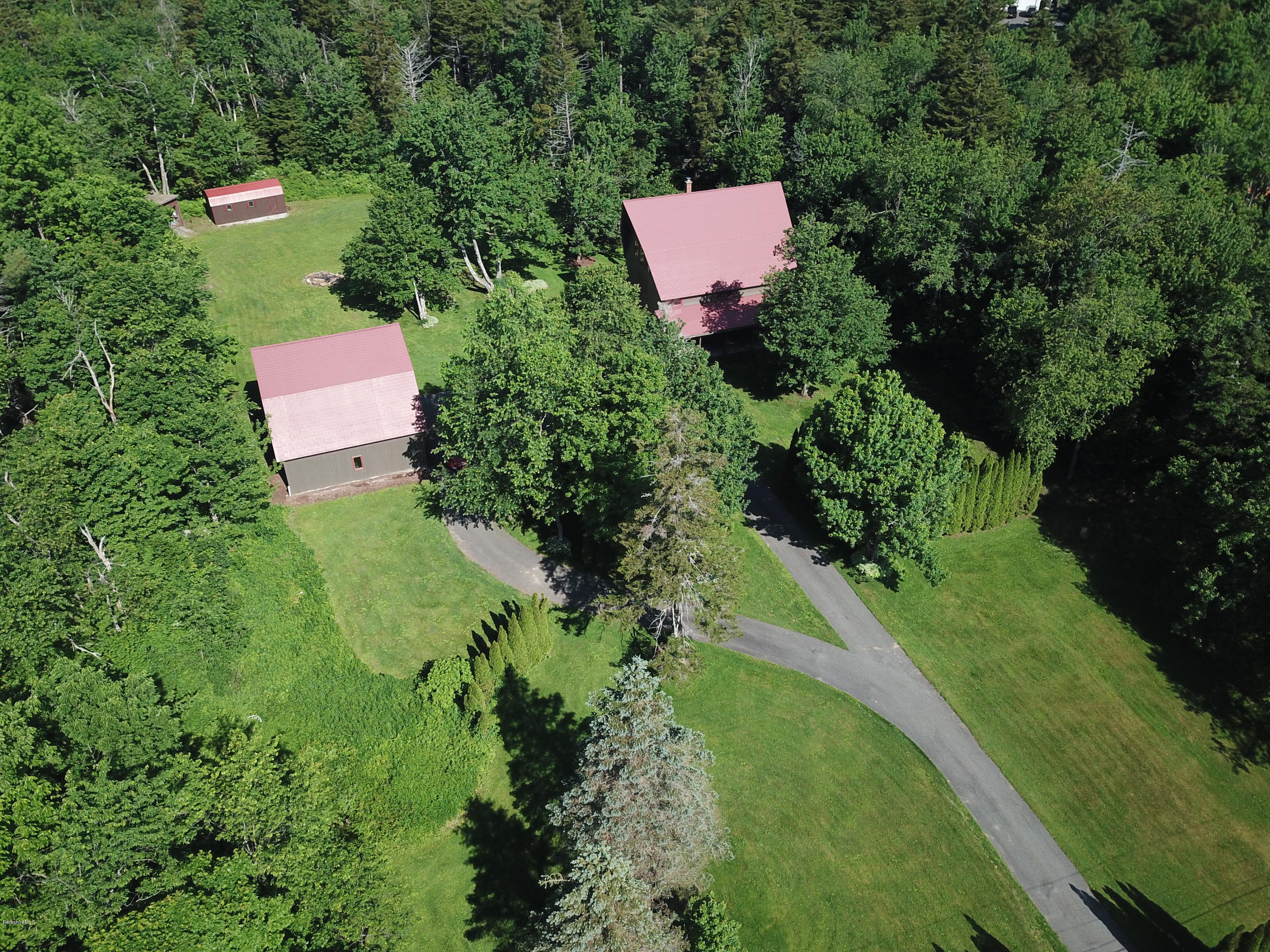 5 N Road Peru, MA 01235 - Photo 41 of 43 an aerial view of a house with a garden and trees