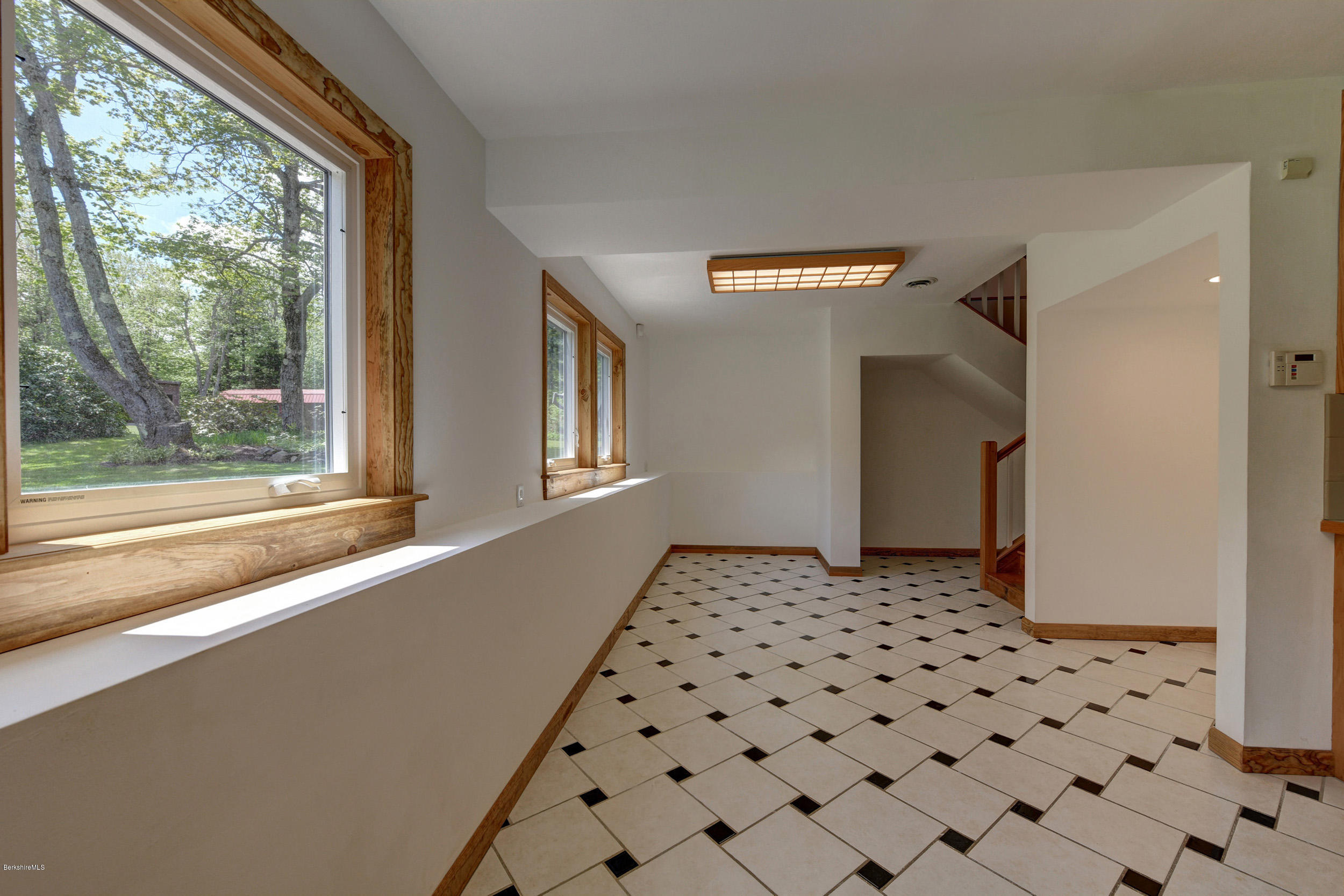 5 N Road Peru, MA 01235 - Photo 7 of 43 a view of a hallway with windows