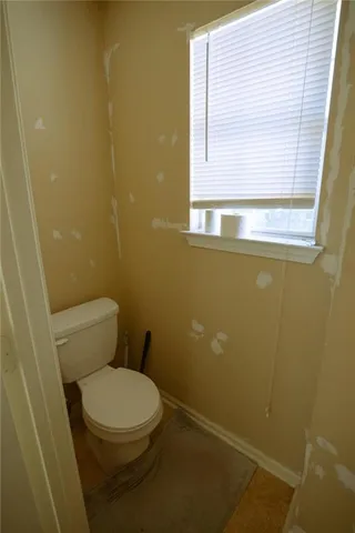 a bedroom with a bed and furniture