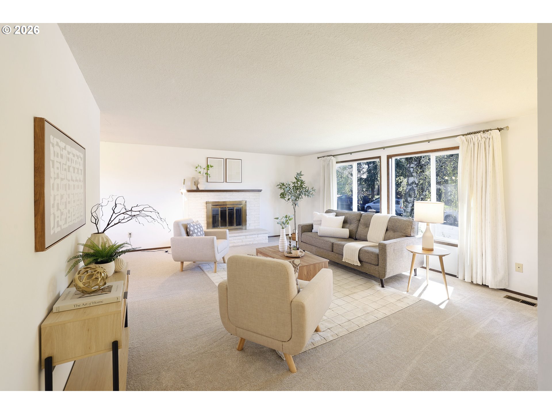 16285 Southwest Rosa Road Beaverton, OR 97007 - Photo 2 of 20 a living room with furniture and a fireplace