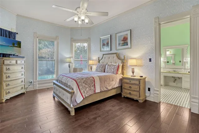 a spacious bathroom with a granite countertop sink and a mirror