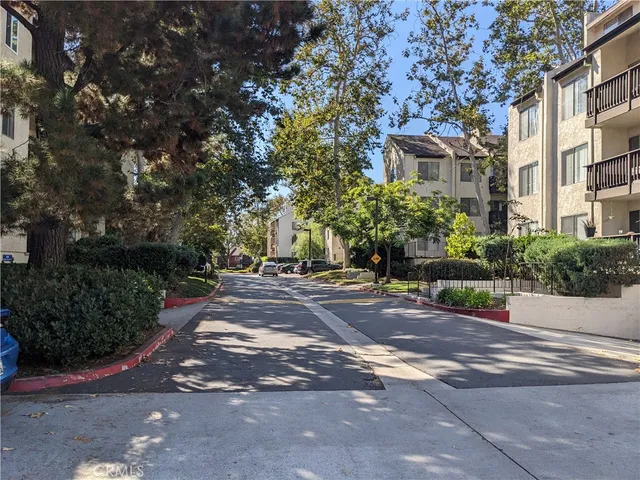 a view of a back yard of a house