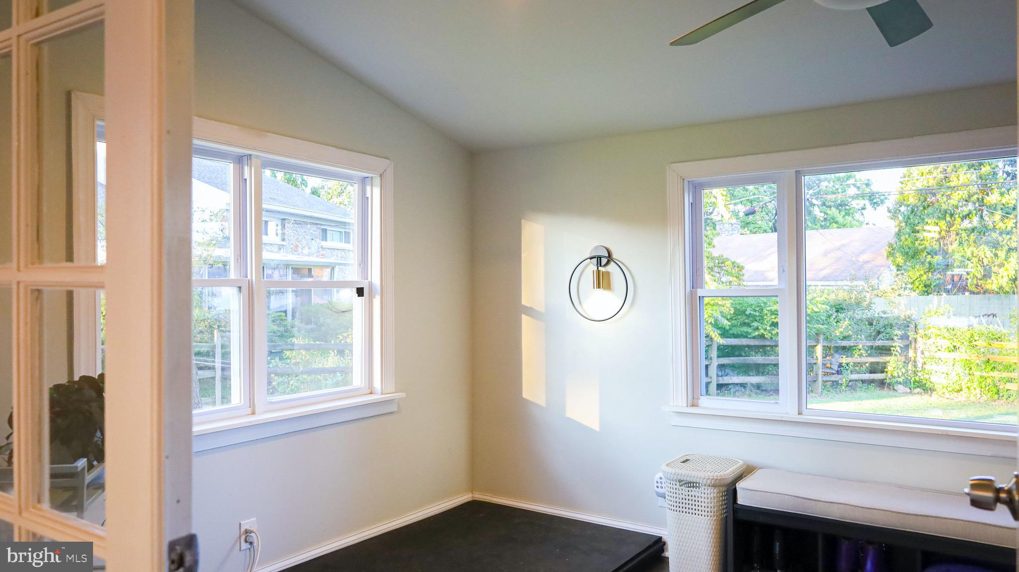 8902 Flagstone Circle Randallstown, MD 21133 - Photo 16 of 46 Sun Room Overlooks Huge Fenced-in Backyard