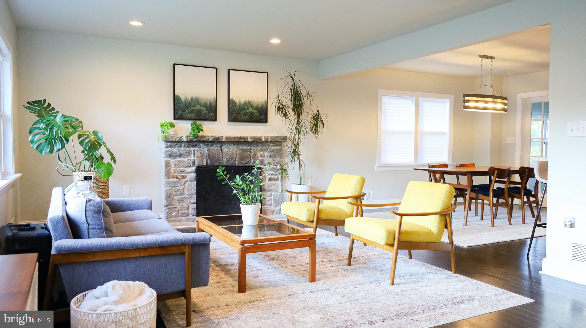 8902 Flagstone Circle Randallstown, MD 21133 - Photo 3 of 46 Sunny Living Room and Fireplace 1 on Main Level