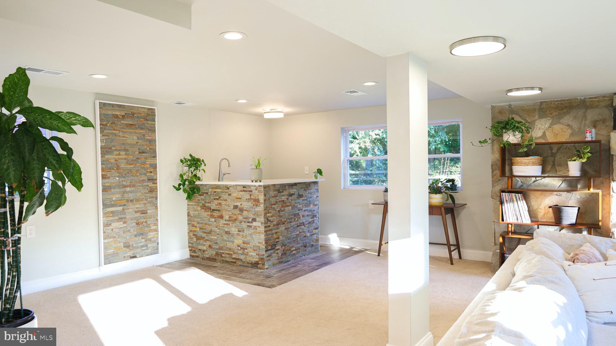 8902 Flagstone Circle Randallstown, MD 21133 - Photo 36 of 46 Wet Bar and Recreation Space on Lower Level 1