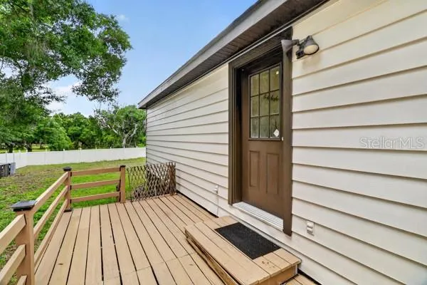 a view of backyard with green space