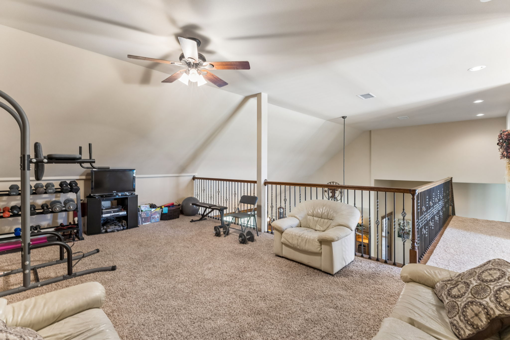 438 Patricia Road Georgetown, TX 78628 - Photo 27 of 36 Upstairs loft, suitable for teen retreat, workout space, hobbies, or extra bedroom if needed.
