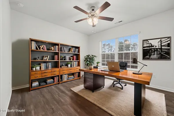 a room with furniture and gym equipment