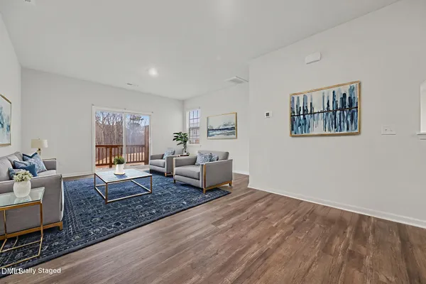 a living room with furniture and a couch