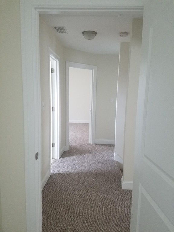 23 Beech Street Springfield, MA 01105 - Photo 9 of 10 a view of a room with a hallway
