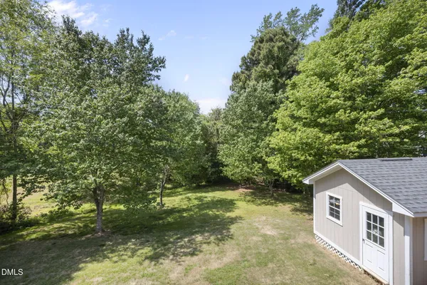 $715,000 | 410 Brook Creek Drive, Cary, NC 27519